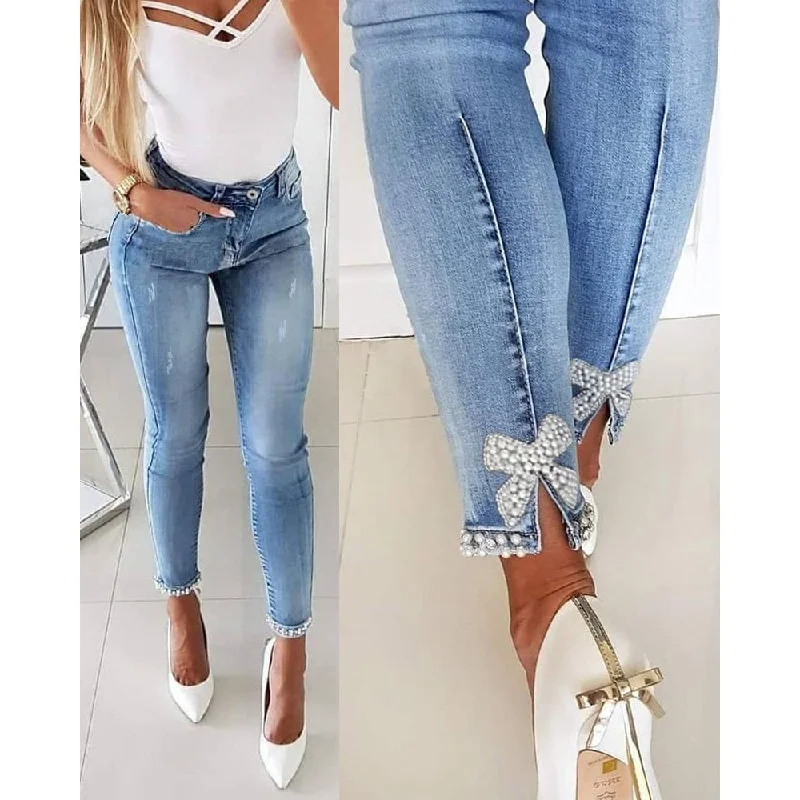 Simple research Temperament Slim Butterfly Beaded Foot Opening Jeans Wholesale Womens Clothing